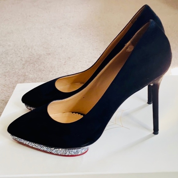 Charlotte Olymipa black heels.